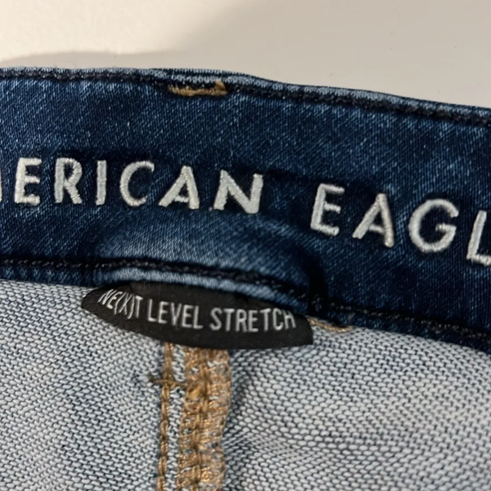 American EAGLE Next Level Stretch Curvy Hi Rise Jeggings Distressed size 18short